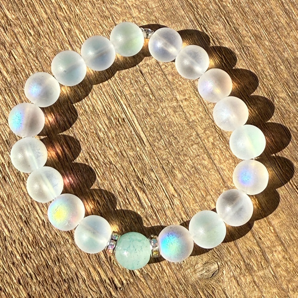 Elegant Frosted rainbow moonstone with a cyan glass focal Bead Bracelet